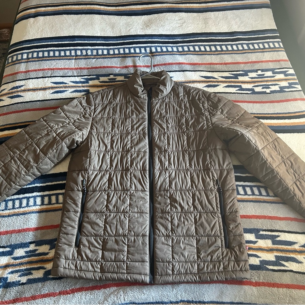 Light puffer jacket is easy to throw on when the weather gets cold.